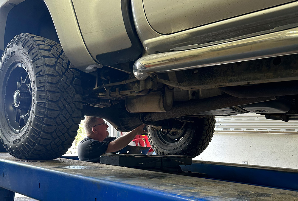Don Smirl performing service on a client's truck